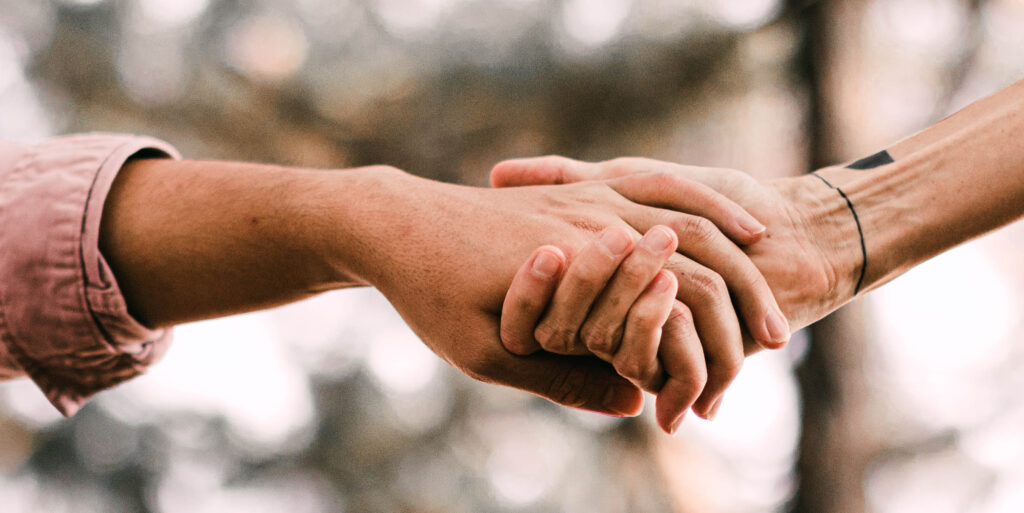 Two hands holding